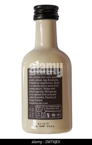 ingredients and storage instructions on back of miniature bottle of Hotel Chocolat velvetised espresso martini chocolate cream liqueur on white Stock Photo