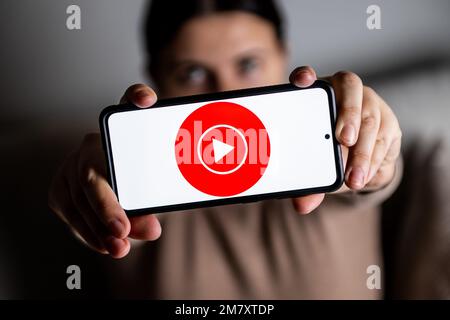 In this photo illustration a YouTube Music logo seen displayed on a smartphone. Stock Photo