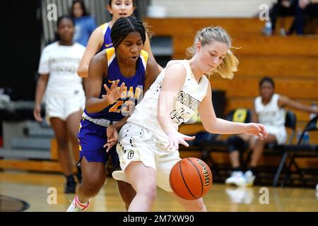 The girls competing during the girls fall high school basketball tournament in Australia Stock Photo