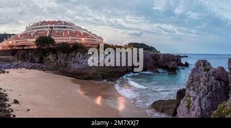 panoramic view of the residential building on the beach of El Sable in the town of Isla, Cantabria, Spain, Europe Stock Photo
