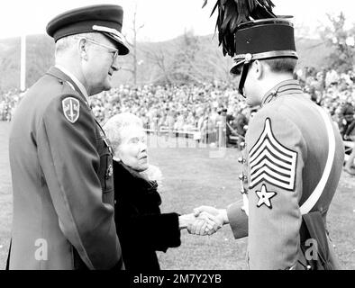 Mrs. Douglas MacArthur, widow of GEN Douglas MacArthur, is introduced to cadet 1 CPT Lawrence Kinde by LGEN Willard W. Scott, superintendent of the U.S. Military Academy. Base: West Point State: New York (NY) Country: United States Of America (USA) Stock Photo