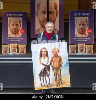 London, England, UK. 11th Jan, 2023. British artist KAYA MAR poses with his latest painting depicting Prince Harry as Don Quixote outside Waterstones bookstore where the royal's memoir Spare is on sale after being launched yesterday. (Credit Image: © Tayfun Salci/ZUMA Press Wire) EDITORIAL USAGE ONLY! Not for Commercial USAGE! Stock Photo