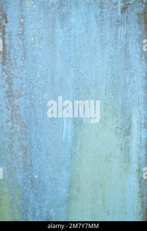 old wooden plank wall with old faded peeling green, yellow paint Stock Photo