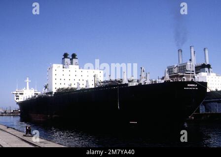 Port quarter view of the Military Sealift Command cargo ship DENEBOLA (T-AK-289), tied to the pier. Base: Philadelphia State: Pennsylvania (PA) Country: United States Of America (USA) Stock Photo