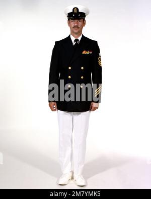 navy chief dress blue uniform File:US Navy 051003-N-9866B-004 Chief Boatswain's Mate Keith Oliver, left, evaluates his Sailors during a Service Dress Blues uniform inspection.jpg