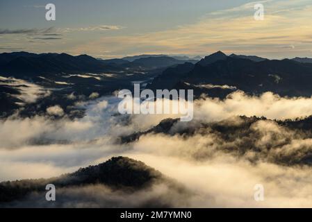 Morning fog in the Llobregat river valley over the Pantà de la Baells reservoir (Berguedà, Barcelona, Catalonia, Spain, Pyrenees) Stock Photo