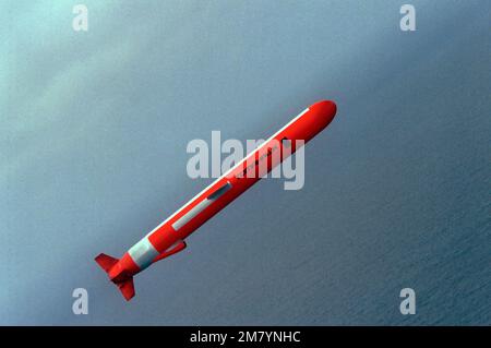 An air-to-air side view of a BGM-109 Tamahawk missile. The Tamahawak ...