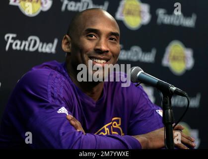Los Angeles Lakers' Kobe Bryant smiles during a press conference in 2016 Stock Photo