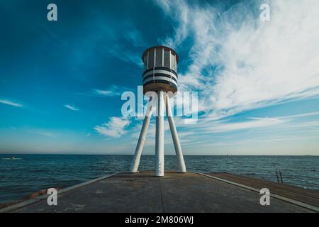 Lifeguard tower with seascape in the background Stock Photo