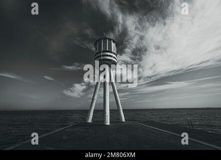 Lifeguard tower with seascape in the background Stock Photo