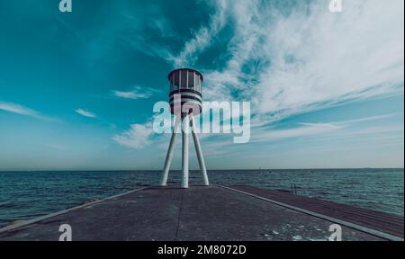 Lifeguard tower with seascape in the background Stock Photo