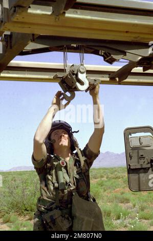 A member of the 3rd Bn., 6th Field Arty., 1ST Infantry Div., operates a ...