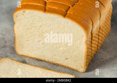 Organic Whole Wheat White Bread Cut into Slices Stock Photo