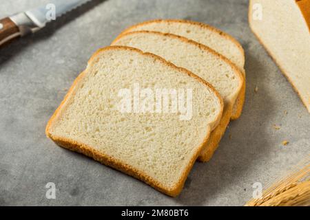 Organic Whole Wheat White Bread Cut into Slices Stock Photo