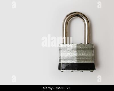 Locked padlock on white background. Stock Photo