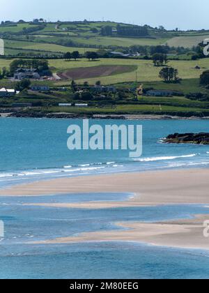 Inchydoney beach at low tide on a sunny day. The famous Irish beach on the south coast of the country. Seaside landscape. Stock Photo
