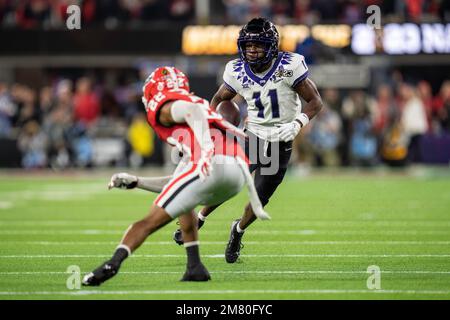 TCU Horned Frogs wide receiver Derius Davis (11) runs the ball after a catch against Georgia Bulldogs defensive back Javon Bullard (22) during the Col Stock Photo