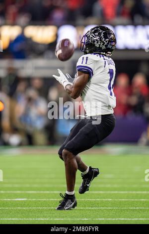 TCU wide receiver Derius Davis runs a drill at the NFL football ...