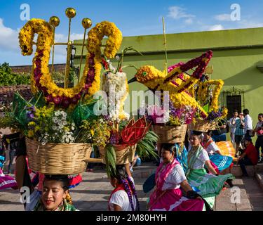 Chinas Oaxaquenas dancers with decorated flower baskets on their heads ...