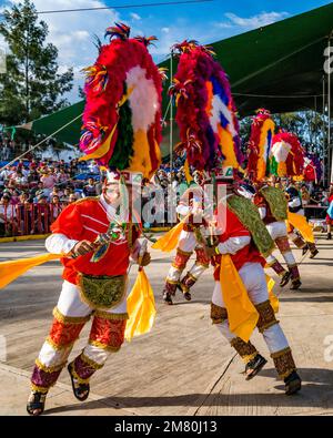 Dancers from Villa de Zaachila perform the Danza la Pluma at the Guelaguetza in San Antonino , Oaxaca, Mexico. Stock Photo