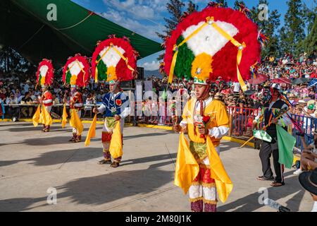 Dancers from Villa de Zaachila perform the Danza la Pluma at the Guelaguetza in San Antonino , Oaxaca, Mexico. Stock Photo