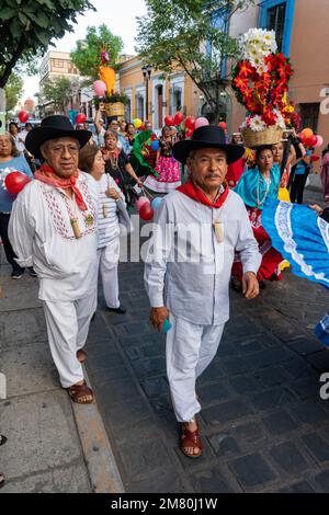 Older people in traditional dress gather for a parade on the streets of  Oaxaca, Mexico Stock Photo - Alamy