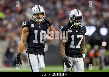 Las Vegas Raiders wide receiver Zay Jones #12 celebrates with running back  Jalen Richard #30, quarterback Derek Carr #4, wide receivers Hunter Renfrow  #13 and Nelson Agholor #15 after scoring a touch