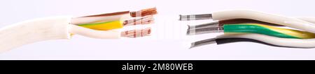 Electric cable without insulation on a white background. Stock Photo