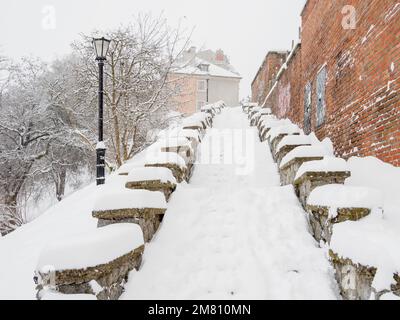 Snow-covered stairs. Old Town in Lublin. Stock Photo