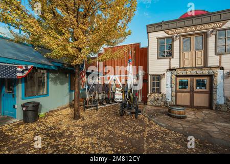 Williams, Arizona, USA - September 27, 2021 Wild West Junction set along Historic Route 66 is the night time place in Williams to have some good adult Stock Photo