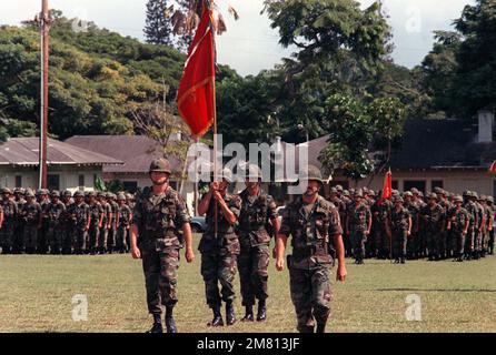 Lieutenant Colonel (LTC) Myrt W. Webb Jr., left and LTC Edward T. Teixeria, right, move forward with the colors of the 1ST Battalion, 8th Field Artillery and the 3rd Battalion, 13th Field Artillery as the 3rd Battalion, 13 Field Artillery is deactivated and redesignated as the 7th Battalion, 8th Field Artillery Regiment. The 8th FAR is on of the first combat arms units to be regimentalized. Base: Schofield Barracks, Kaneohe Bay State: Hawaii (HI) Country: United States Of America (USA) Stock Photo