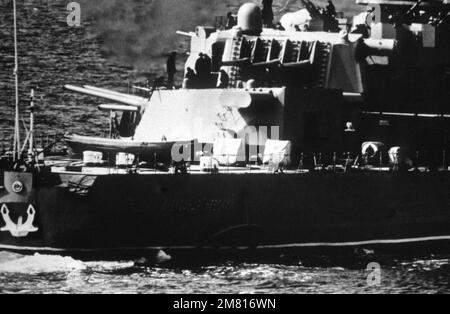 A starboard quarter view of a Soviet Sverdlov class light cruiser ...