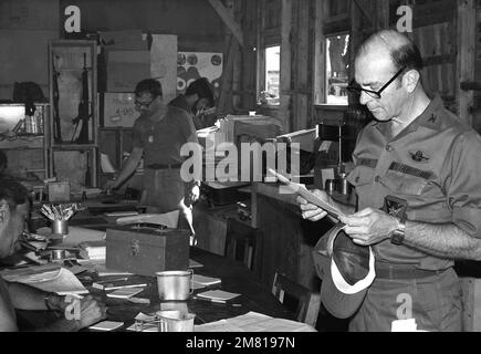 US Air Force personnel are briefed on Cuban documents seized during the multiservice, multinational Operation URGENT FURY. Subject Operation/Series: URGENT FURY Country: Grenada (GRD) Stock Photo