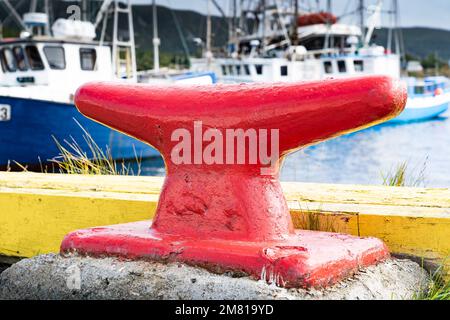 Large boat cleat used for securing fishing vessels at a seaside port in Heart's Content Newfoundland Canada. Stock Photo