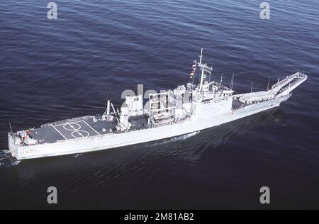 Aerial starboard quarter view of the Newport class tank landing ship USS FRESNO (LST-1182) underway. Country: Pacific Ocean (POC) Stock Photo