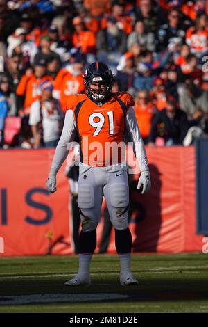 Carolina Panthers defensive tackle Marquan McCall (left) exchanges jerseys  with Denver Broncos defensive end Matt Henningsen (right) following an NFL  football game, Sunday, Nov. 27, 2022, in Charlotte, N.C. (AP Photo/Brian  Westerholt