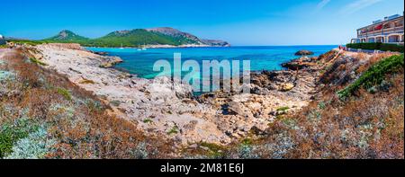 A panoramic view of the Cala Agulla Beach on a sunny day in Majorca, Spain Stock Photo