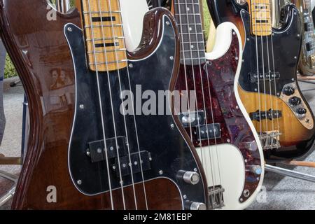 Lafayette - Circa December 2022: Fender Jazz and Precision bass guitar display at a music store. Fender bass guitars are popular among recording artis Stock Photo