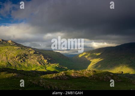 Cumbria, UK: Hardknott Pass, a high mountain route in the Lake District. Looking East towards Ulpha Fell and Cockley Beck Fell. Stock Photo