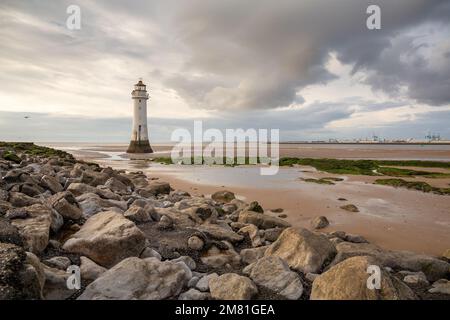 New Brighton, UK: Perch Rock Lighthouse at low tide. An iconic landmark on the Wirral peninsula. Stock Photo