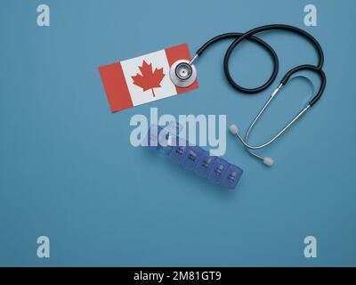 Overhead flat lay of a doctor's stethoscope with a purple weekly pill organizer and the Canadian flag against a blue background Stock Photo