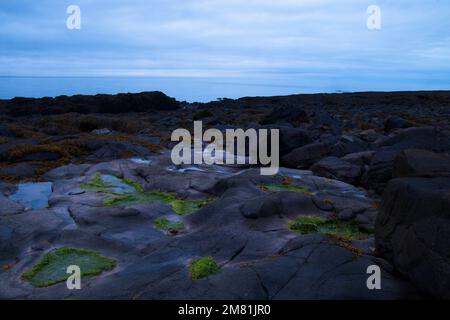 The Bay of Fundy between tides along the coastline of Nova Scotia. Stock Photo