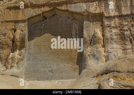 BISOTUN, IRAN - JULY 13, 2019: Safavid inscription in Mithradata (Mithridates) II relief in Bisotun, Iran Stock Photo