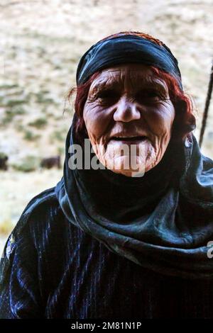 ZAGROS, IRAN - JULY 7, 2019: Nomad woman in Zagros mountains, Iran Stock Photo
