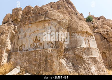 Ahura Mazda and Ardashir I relief in Naqsh-e Rostam, Iran Stock Photo