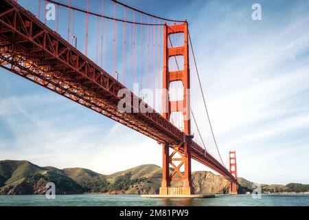 San Francisco's iconic Golden Gate Bridge taken from the shore Stock Photo