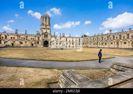 Tom Quad or the Great Quadrangle of Christ Church College is the largest college quad in Oxford. Tom Tower is a bell tower that forms the entrance to Stock Photo