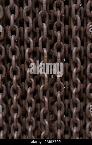 Background of hanging old rusty metal chains Stock Photo