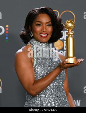 January 10, 2023, Beverly Hills, California, USA: American star ANGELA BASSETT, holds her Golden Globe award balanced on palm of her hand, Tuesday for her stellar performance as Queen Ramonda in “Black Panther: Wakanda Forever,” making the 64-year-old the first actor ever to win a major individual acting award for a movie based on Marvel Comics, at the 80th Annual Golden Globe Awards. (Credit Image: © Billy Bennight/ZUMA Press Wire) EDITORIAL USAGE ONLY! Not for Commercial USAGE! Stock Photo