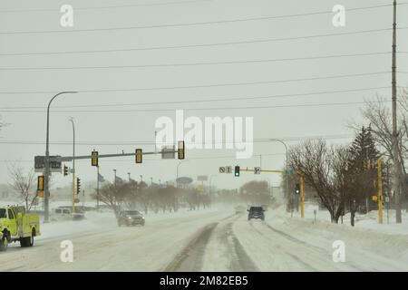 Snow is piled along streets of Bismarck, North Dakota from heavy ...
